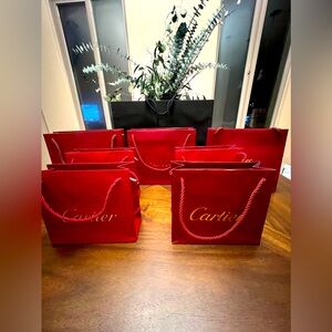 Cartier set of 7 shopping bags
